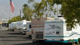 RV's parked in spacious outdoor parking storage area