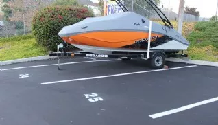 Boat parked in vehicle storage space